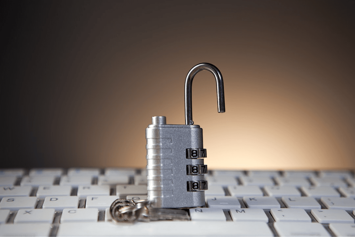 Security illustration with lock on keyboard